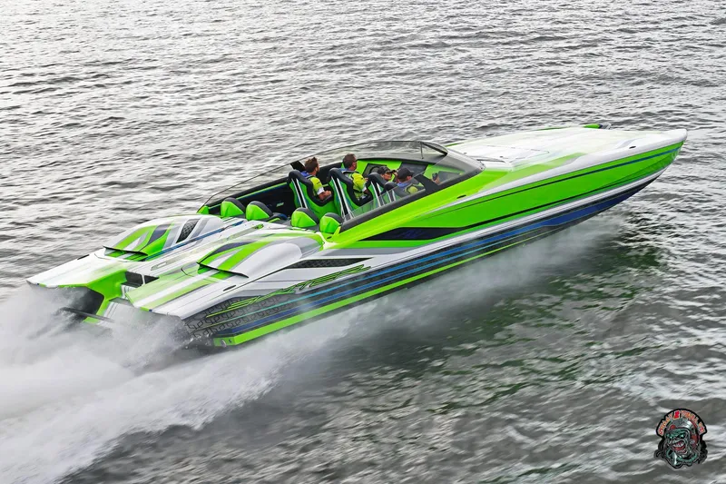 Slide: The Image of High-speed Skater 388 powerboat, 2025 model, in vibrant green and white, cruising on water. - 34