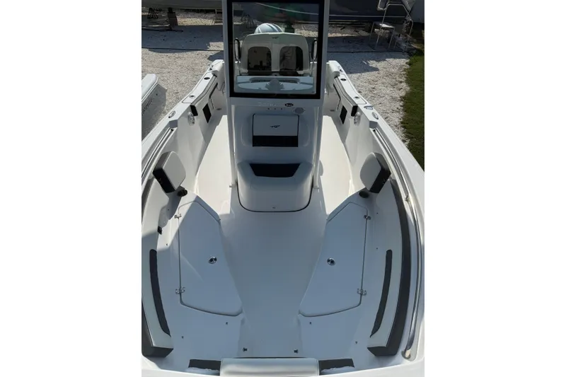 Slide: The Image of 2027 Tidewater 220 LXF boat interior with seating and storage compartments. - 4