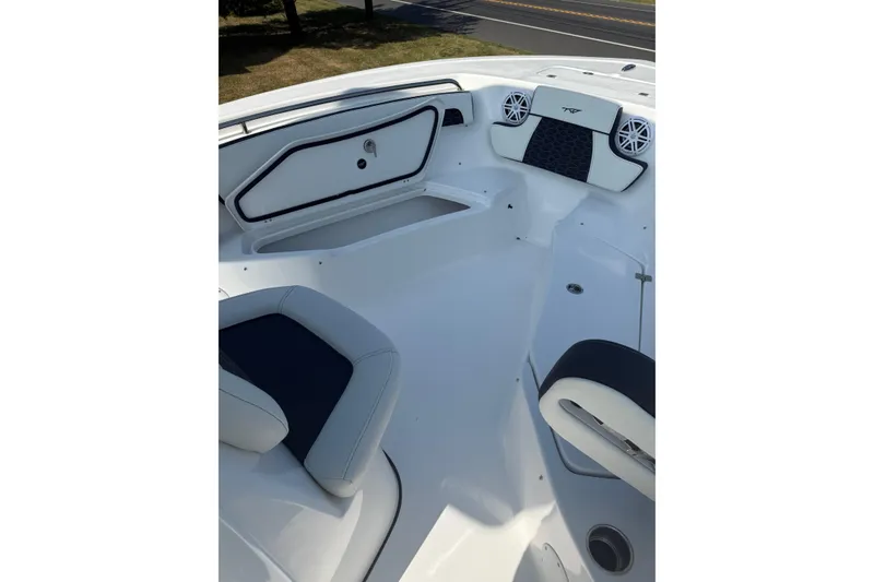 Slide: The Image of Interior view of 2027 Tidewater 220 LXF boat, featuring sleek seating and modern design. - 5