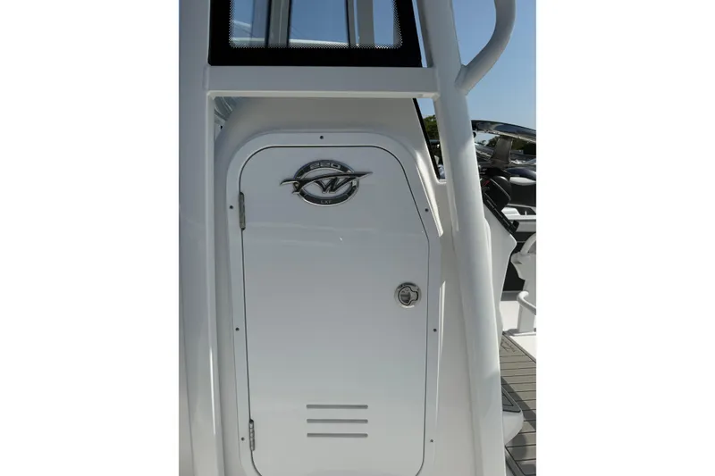 Slide: The Image of 2027 Tidewater 220 LXF boat door with logo and sleek design. - 3
