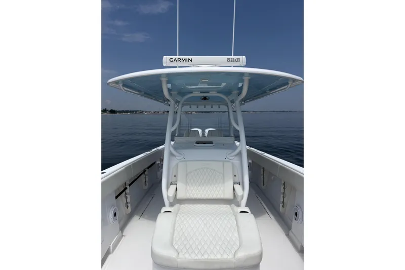 Slide: The Image of 2021 Jupiter 38 HFS boat with Garmin equipment on calm water. - 7