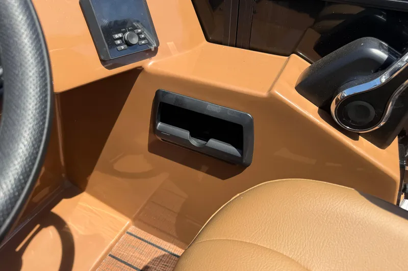 Slide: The Image of Interior of 2026 Bentley Pontoons Legacy 223 Swingback, featuring control panel and seating. - 17