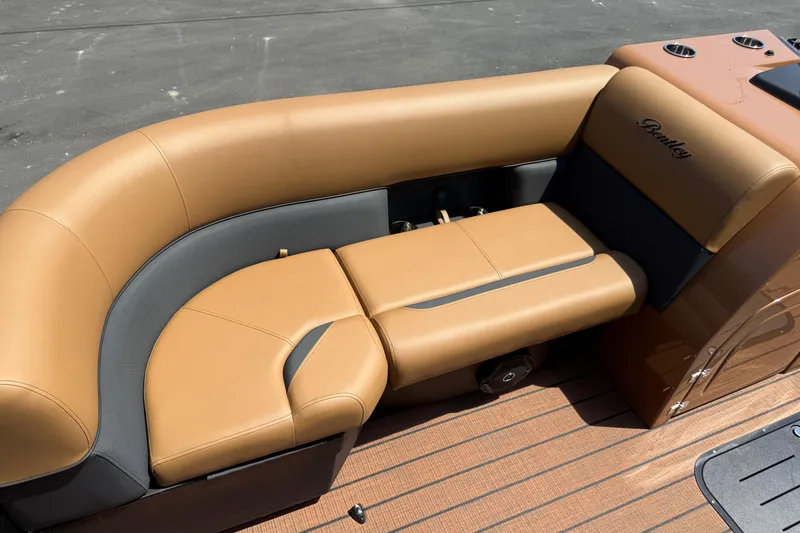 Slide: The Image of 2026 Bentley Pontoons Legacy 223 Swingback with luxurious tan seating and sleek design. - 7