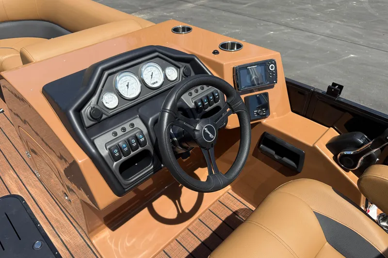 Slide: The Image of 2026 Bentley Pontoons Legacy 223 Swingback dashboard with steering wheel and control panel. - 16