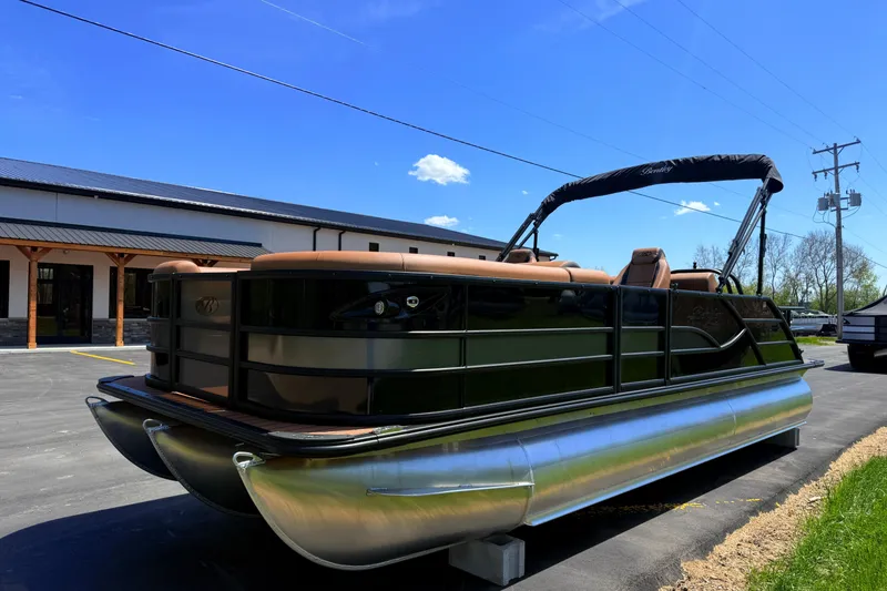 Slide: The Image of 2026 Bentley Pontoons Legacy 223 Swingback pontoon boat displayed outdoors on a sunny day. - 3