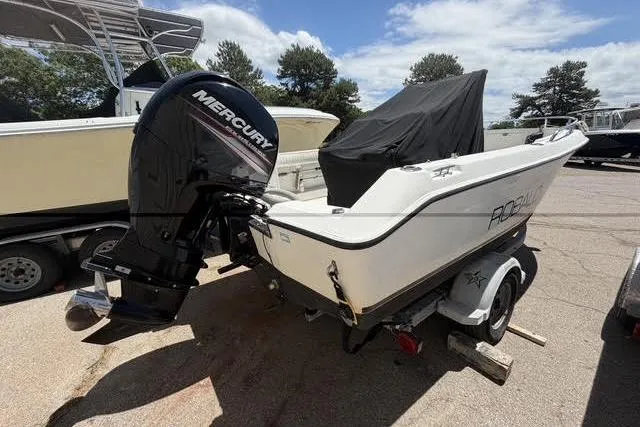Slide: The Image of 2000 Robalo 1820 Center Console boat with Mercury engine on trailer. - 3