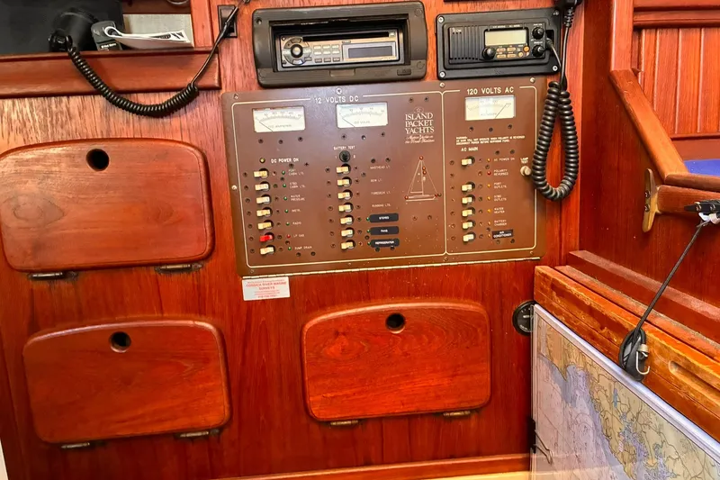 Slide: The Image of Control panel of a 1991 Island Packet 29 yacht with navigation equipment. - 28