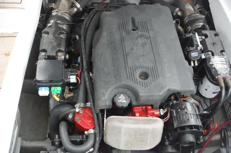 Slide: The Image of Engine compartment of a 2008 Chris-Craft Launch 25 boat, featuring a Volvo Penta engine. - 9