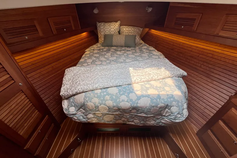 Slide: The Image of Luxurious cabin interior of 2018 Sabre 42 Fly Bridge Sedan with cozy bedding. - 33