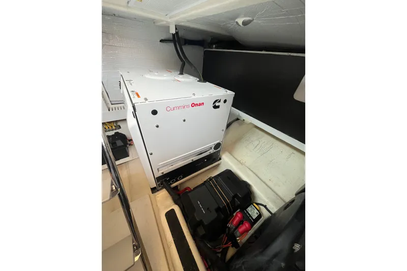 Slide: The Image of Cummins Onan generator in 2018 Sabre 42 Fly Bridge Sedan engine room. - 41