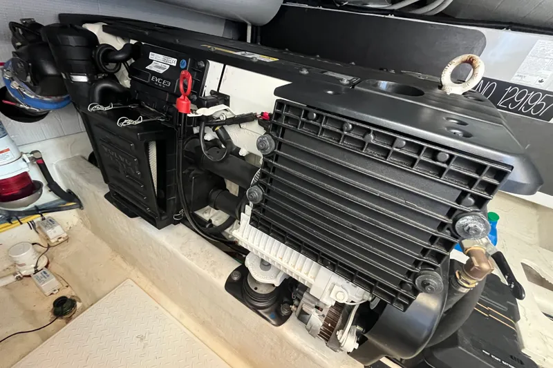 Slide: The Image of Engine compartment of a 2018 Sabre 42 Fly Bridge Sedan, showcasing mechanical components. - 44