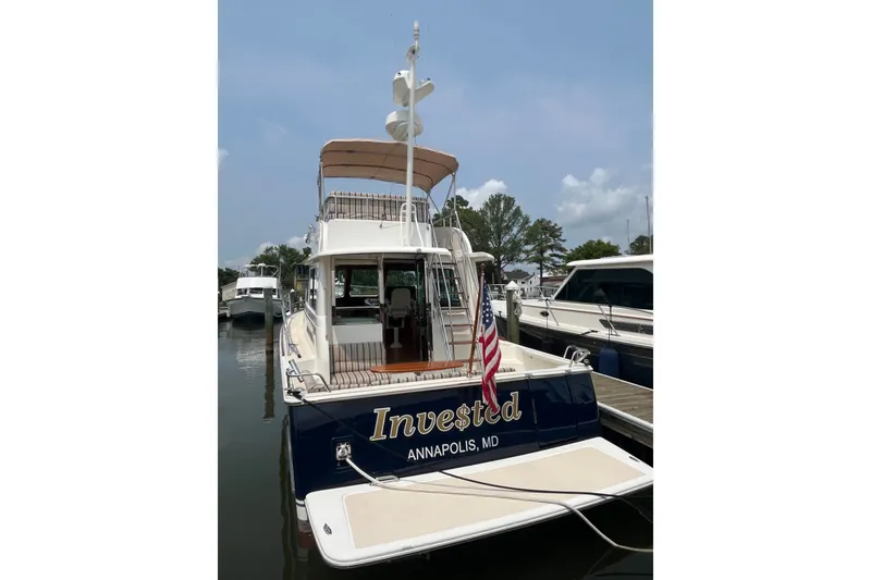 Slide: The Image of 2018 Sabre 42 Fly Bridge Sedan docked in Annapolis marina. - 4