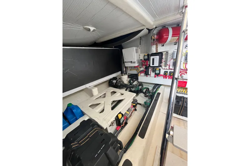 Slide: The Image of Engine room of 2018 Sabre 42 Fly Bridge Sedan with equipment and wiring. - 39