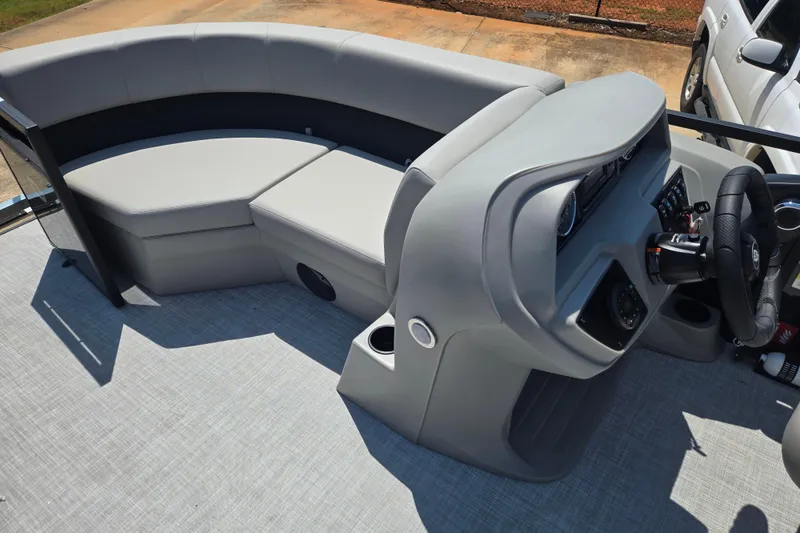 Slide: The Image of Interior view of 2026 Dockside 22DQ275 boat with modern seating and steering console. - 7