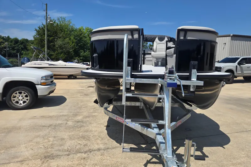 Slide: The Image of 2026 Dockside 22DQ275 pontoon boat on trailer, parked outdoors under clear sky. - 20