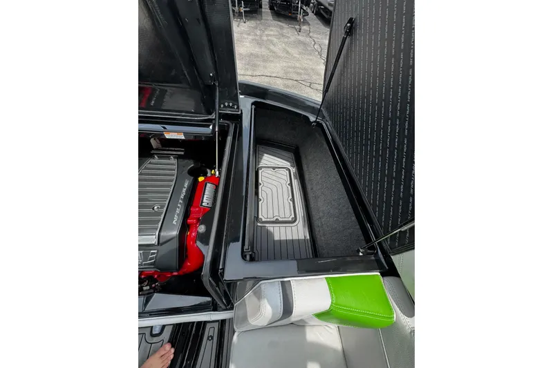 Slide: The Image of Open engine compartment of 2014 Nautique Super Air Nautique G21 boat. - 20