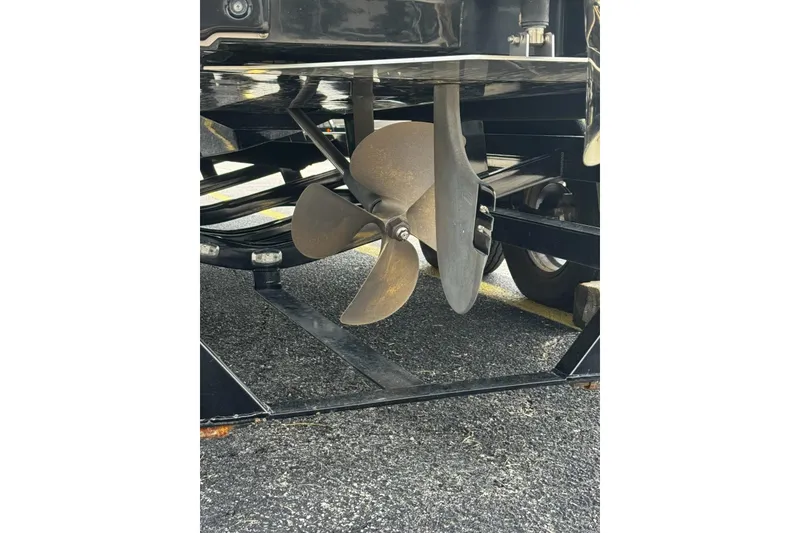 Slide: The Image of Propeller of 2014 Nautique Super Air Nautique G21 boat on trailer. - 8