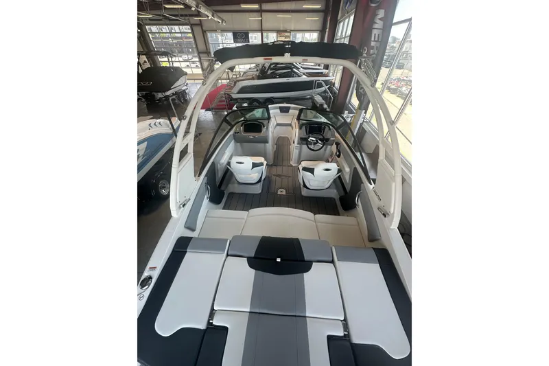 Slide: The Image of 2026 Chaparral 21 SSi boat interior with modern seating and sleek design. - 4