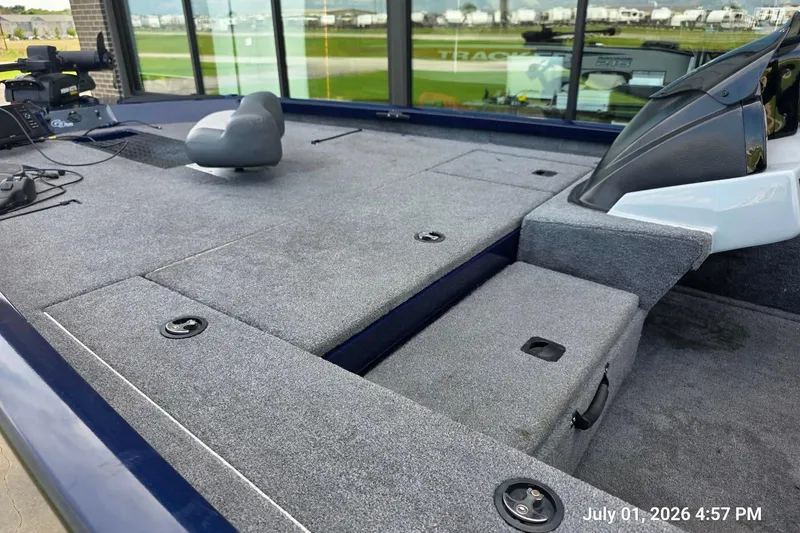 Slide: The Image of 2017 G3 Sportsman 18 boat interior with gray carpet and seating. - 3
