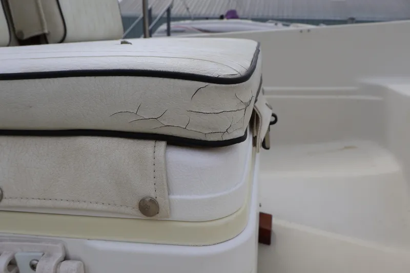 Slide: The Image of Cracked seat cushion on a 1991 Boston Whaler 170 Montauk boat. - 40