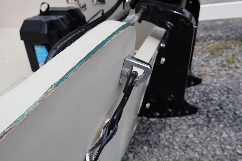 Slide: The Image of Close-up of a 1991 Boston Whaler 170 Montauk boat's transom with wiring detail. - 31