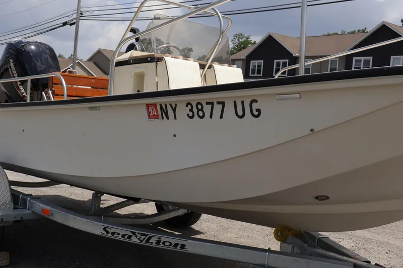 Slide: The Image of 1991 Boston Whaler 170 Montauk boat on trailer, registration NY 3877 UG. - 4