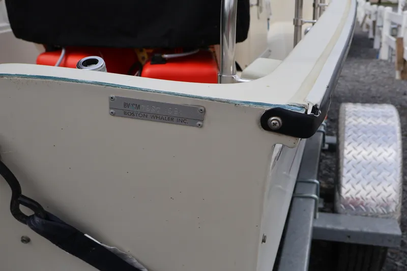 Slide: The Image of 1991 Boston Whaler 170 Montauk boat on trailer, showing manufacturer's plate. - 35