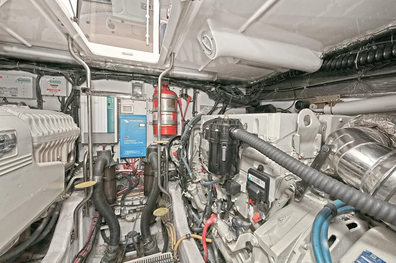 Slide: The Image of Engine room of 2008 Tiara Yachts 4200 Open, showcasing mechanical components and equipment. - 46