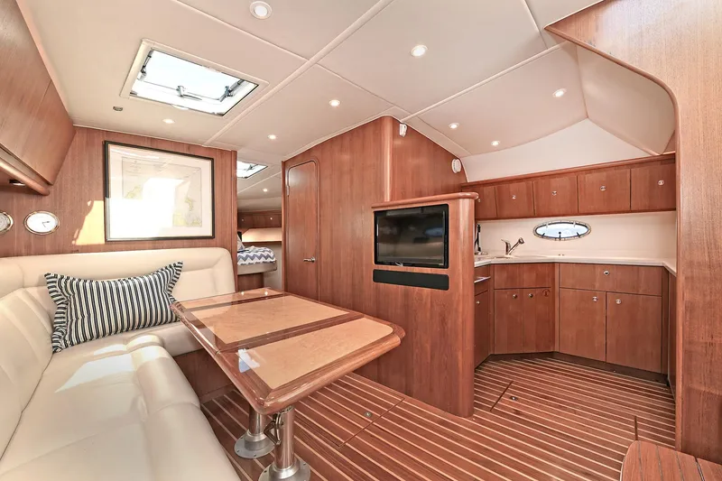 Slide: The Image of Luxurious interior of 2008 Tiara Yachts 4200 Open, featuring elegant wood finishes and modern amenities. - 36