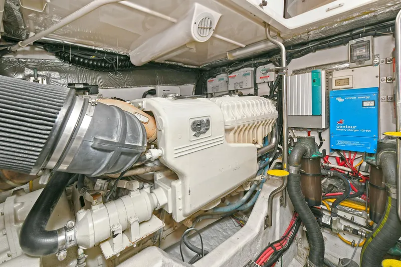 Slide: The Image of Engine room of 2008 Tiara Yachts 4200 Open, showcasing detailed mechanical components. - 47