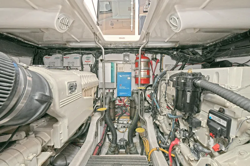 Slide: The Image of Engine room of 2008 Tiara Yachts 4200 Open, showcasing machinery and equipment. - 44