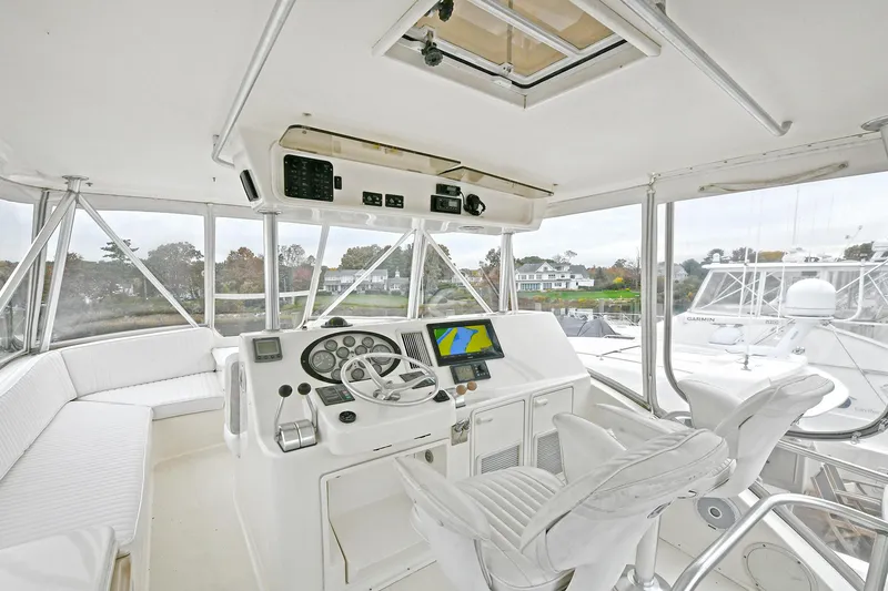 Slide: The Image of Interior view of Ocean Yachts 52 Super Sport 2001 helm station. - 18