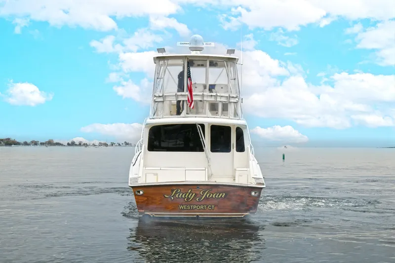 Slide: The Image of Ocean Yachts 52 Super Sport 2001 on calm water, rear view. - 7