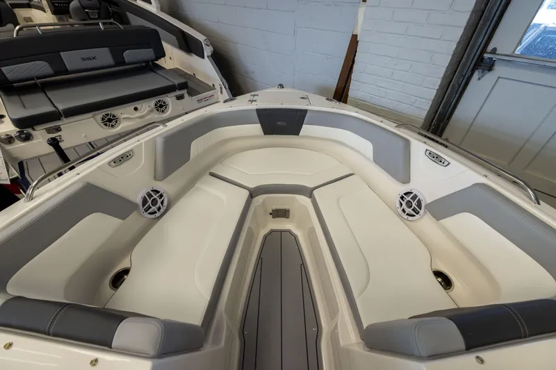 Slide: The Image of 2026 Chaparral 23 SSi OB boat interior with spacious seating and modern design. - 10