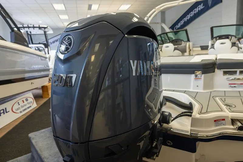 Slide: The Image of 2026 Chaparral 23 SSi OB with Yamaha 200 outboard engine in showroom. - 6