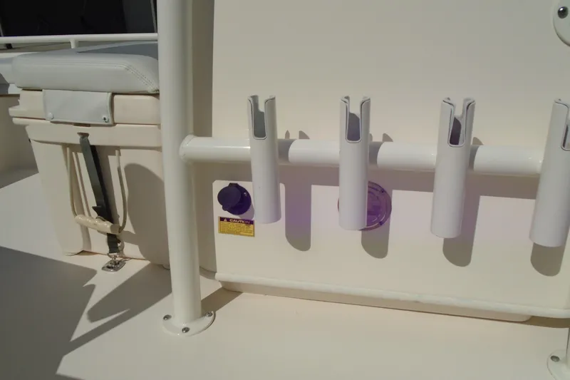 Slide: The Image of Rod holders and seating on a 2022 Pathfinder 2200 TRS boat. - 22