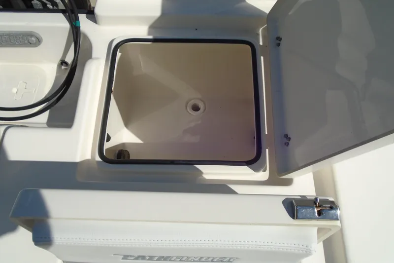 Slide: The Image of Open storage compartment on 2022 Pathfinder 2200 TRS boat deck. - 26