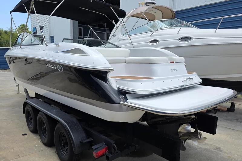 Slide: The Image of A 2008 Cobalt 272 boat on a trailer, ready for use. - 5