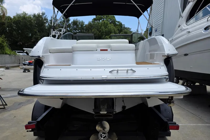 Slide: The Image of Rear view of a 2006 Cobalt 272 boat on a trailer, showcasing its sleek design. - 3