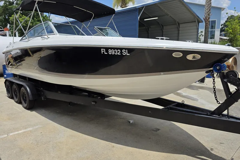 Slide: The Image of A 2008 Cobalt 272 boat on a trailer, ready for transport. - 2