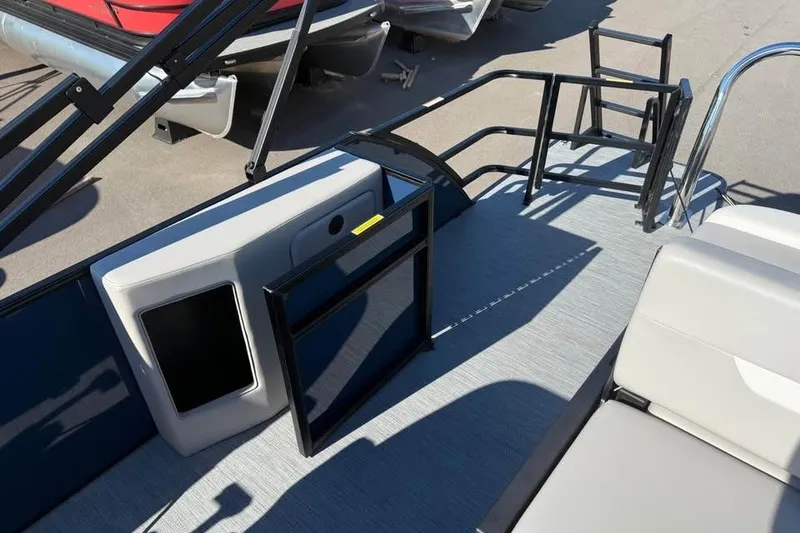 Slide: The Image of 2027 Godfrey EX 2286 SFLX boat interior with seating and railing details. - 15