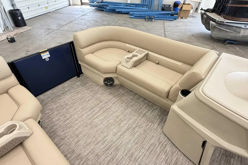 Slide: The Image of Luxurious interior of 2027 Godfrey EX 2286 SBX pontoon boat with beige seating. - 5