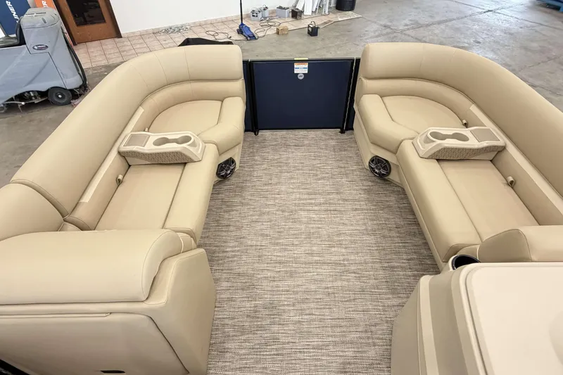 Slide: The Image of Luxurious interior of 2027 Godfrey EX 2286 SBX pontoon boat with beige seating. - 4