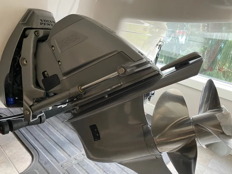 Slide: The Image of Close-up of a Volvo Penta outboard motor on a boat. - 33