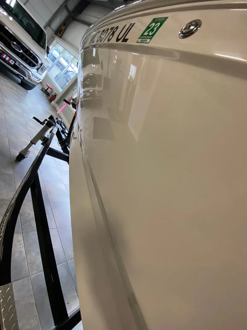 Slide: The Image of Chaparral 24 SSI 2020 in a garage on a trailer. - 12