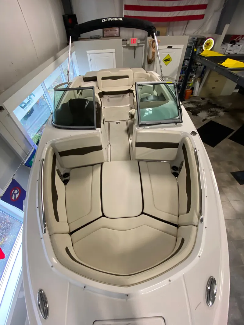 Slide: The Image of 2020 Chaparral 24 SSI with beige upholstery and open cockpit. - 17