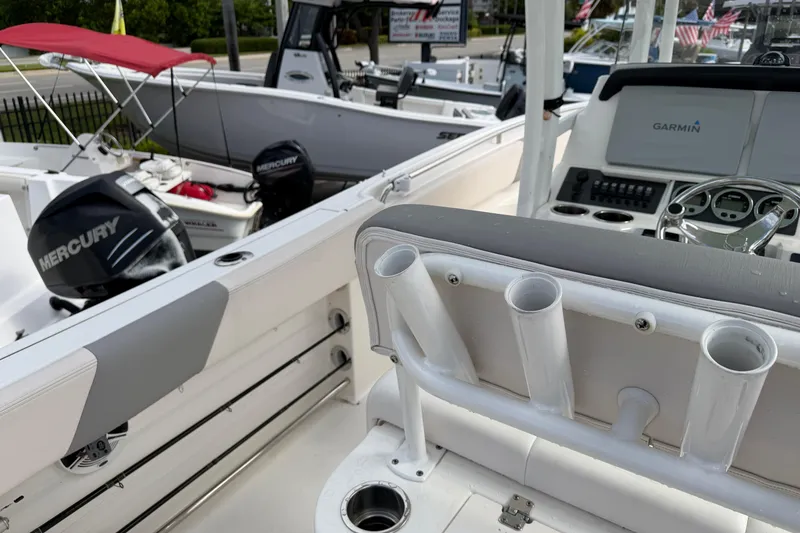 Slide: The Image of 2017 Robalo R242 Center Console boat interior with Mercury engine and Garmin dashboard. - 16