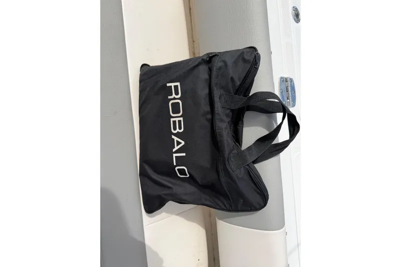 Slide: The Image of Black Robalo bag on a 2017 Robalo R242 Center Console boat seat. - 68