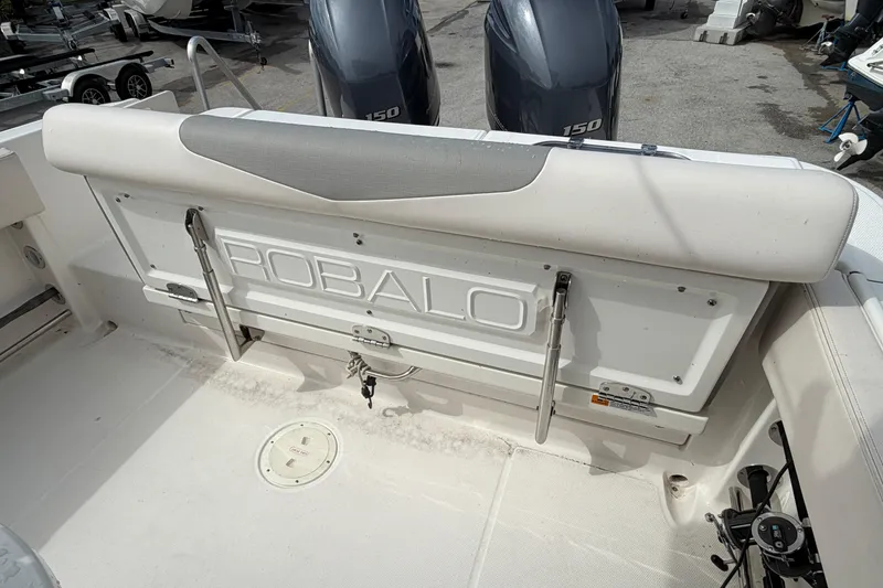 Slide: The Image of 2017 Robalo R242 Center Console boat with dual 150 horsepower engines. - 42