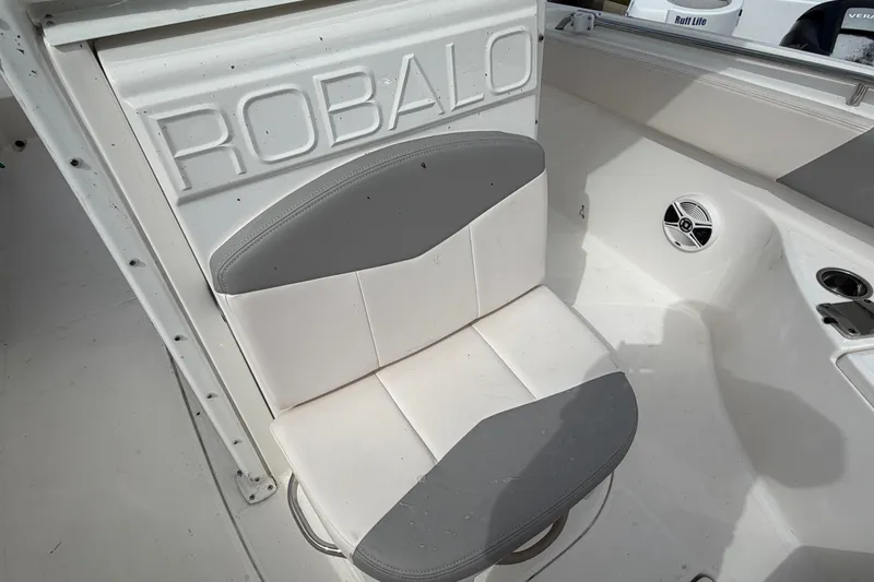 Slide: The Image of 2017 Robalo R242 Center Console boat seat with logo and speaker. - 63